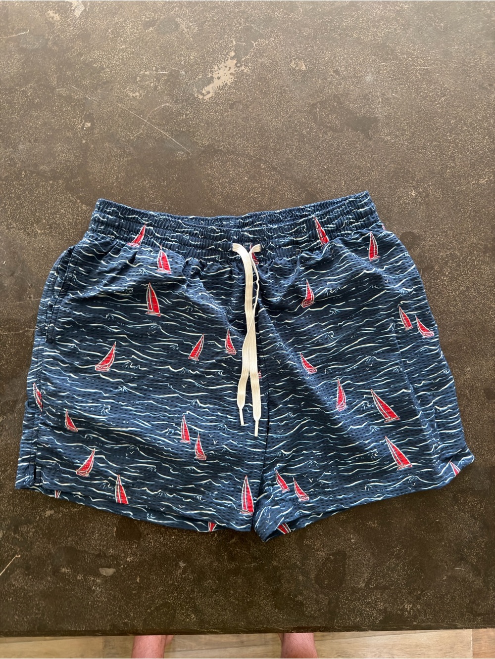 chubbies medium 5.5” inseam Navy Blue Swim Trunks with Red Sailboat Print